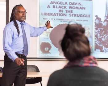 Colorado State University Ethnic Studies assistant professor Ray Black gives a guest lecture on women artists of the civil rights movement in the 1960s in a Women in Art class, March 25, 2016.