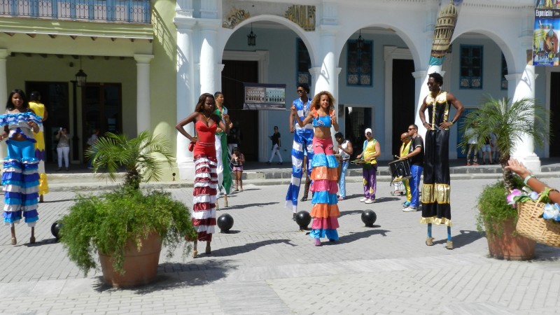 Street performers in colonial Havana.