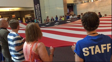 Heidi Fuhrman flag folding at the Smithsonian Museum