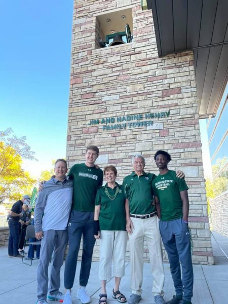 Linda and Bob Cates joined by Coach Niko Medved and members of the CSU men’s basketball team