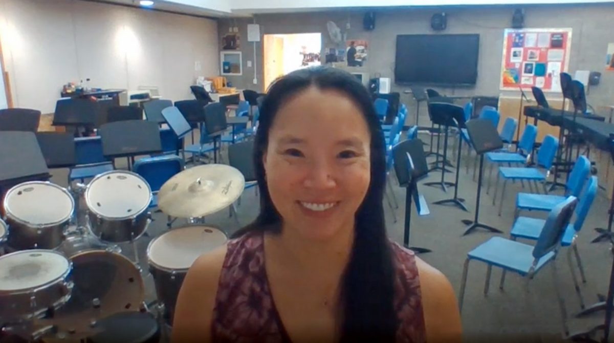 Jana Webster-Wheeler with the band room she teaches in behind her