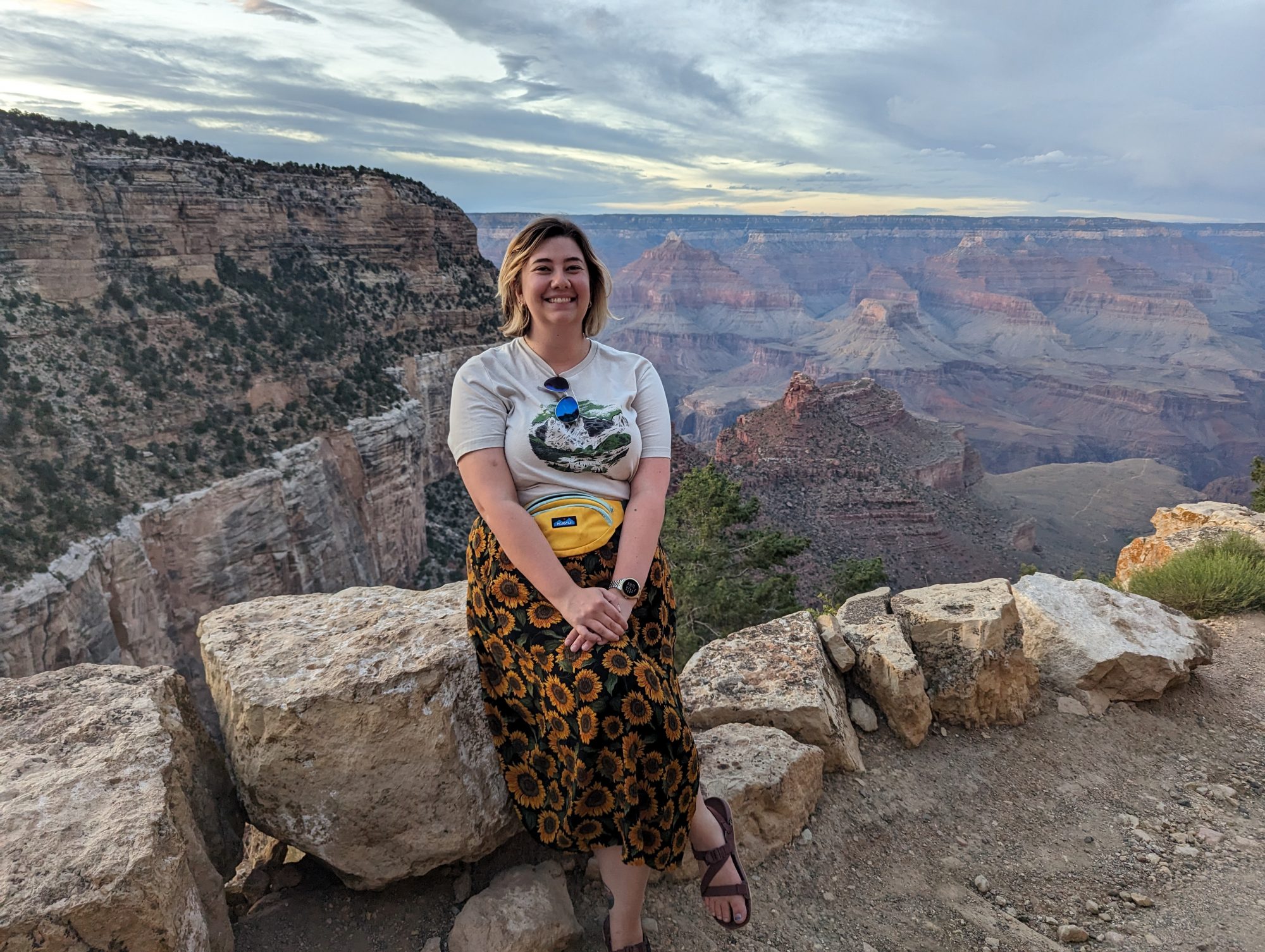 Poppie Gullett posing for a photo at the rim of the Grand Canyon in Arizona