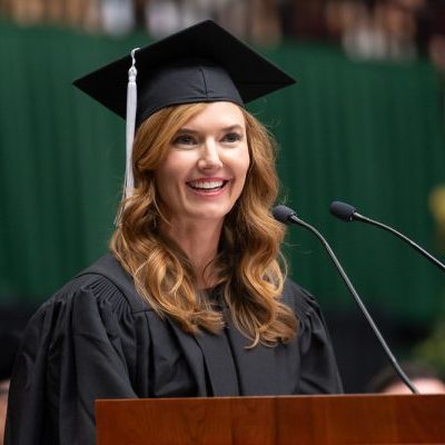 Martha McGee at Spring 2024 commencement delivering the alumni commencement address