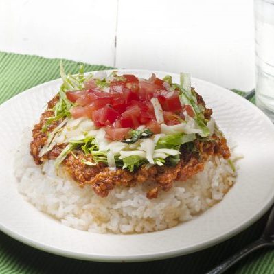Taco rice is a local Okinawan dish made by sprinkling meat sauce on rice.