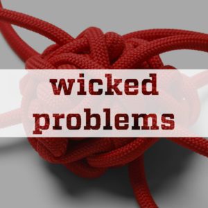 Wicked problems text over a knot